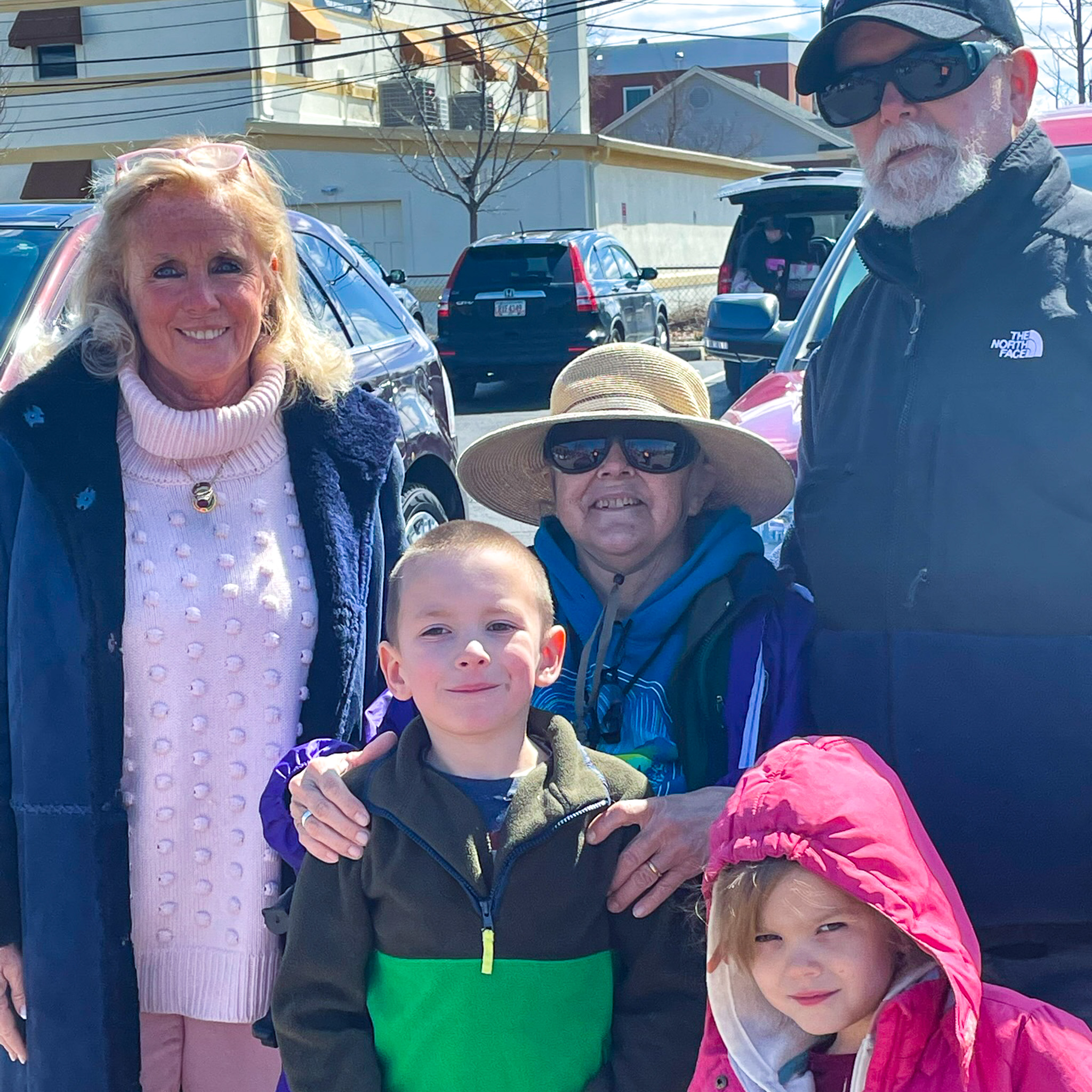 Dingell with family at Moving the Mitten Easter Egg Hunt