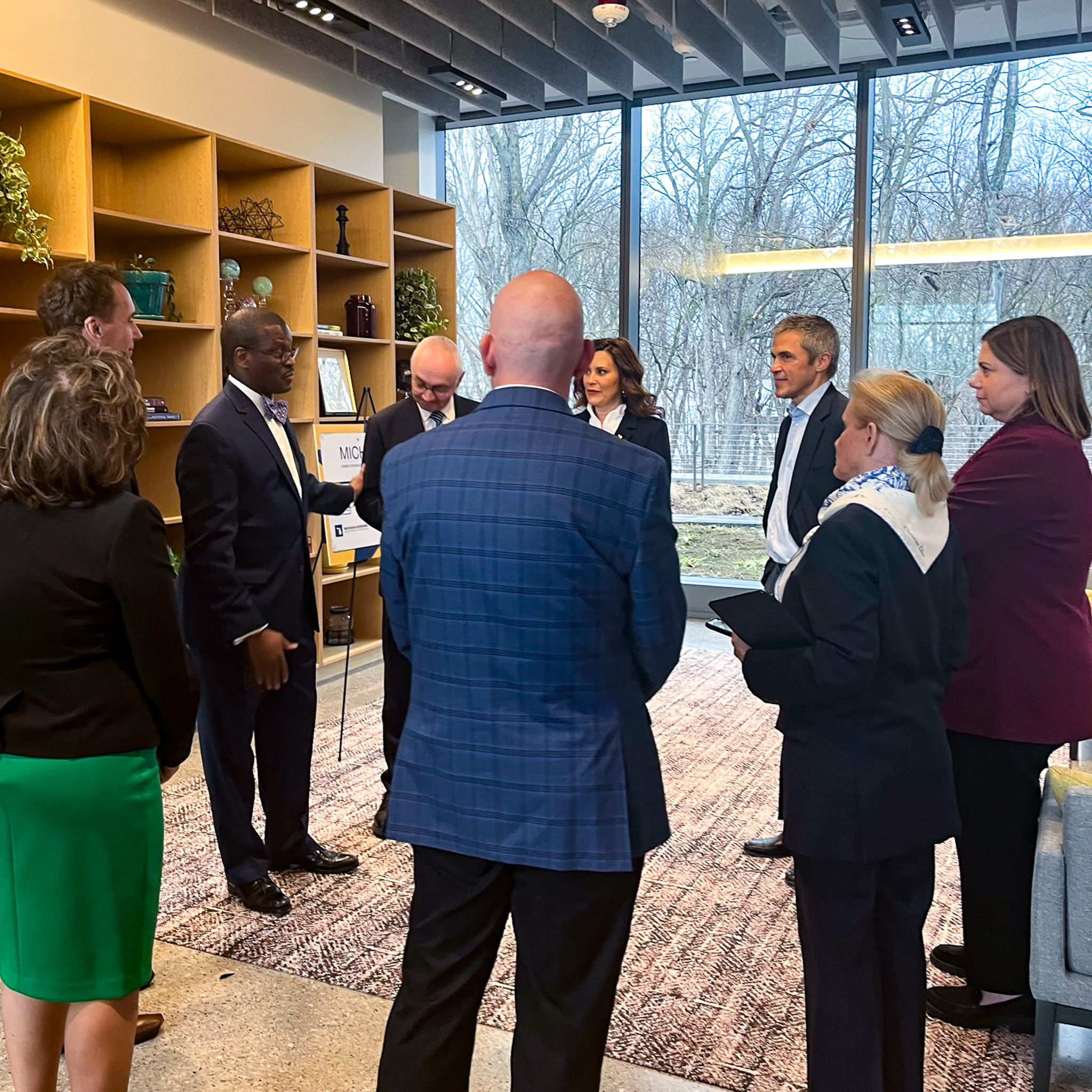 Rep. Dingell with Gov. Whitmer, Rep. Slotkin, and others at Keep Looking Ahead Meeting